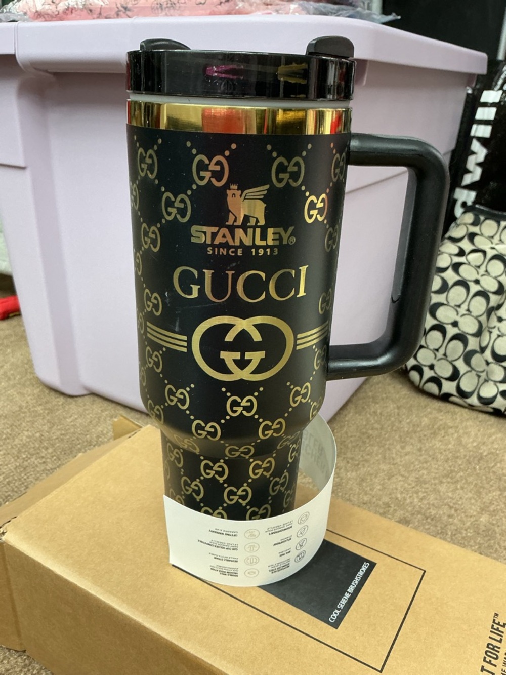 Stanley Black and Gold Travel Mug with Logo Pattern